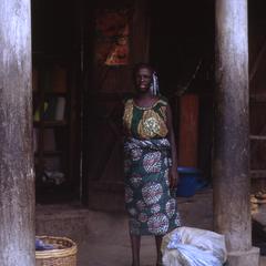 Woman in front of shop