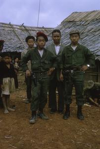 Ethnic Hmong official with soldiers