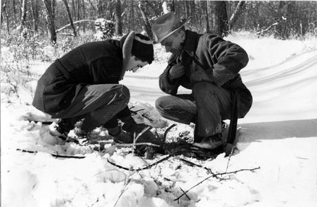 Carl and Aldo Leopold lighting fire for winter picnic
