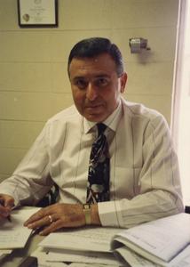 Biology professor Sami Saad at his desk