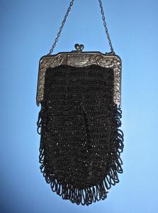 Beaded bag with black beading
