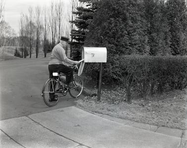 Dr. Jim Dan Hill with bicycle