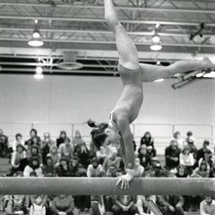 Female gymnast on balance beam