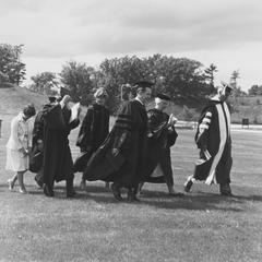 Faculty recessional in outdoor commencement ceremony