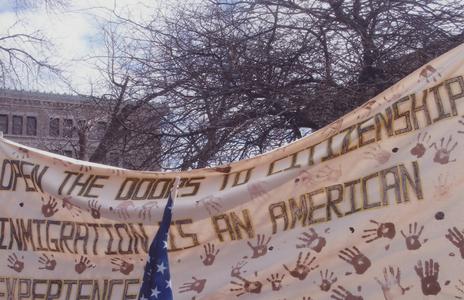 Banner protesting immigration limits