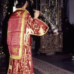 Deacon censing the altar during Pentecost service
