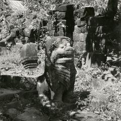 Wat Phou Khmer temple ruins, carved lion along causeway in Champasak Province