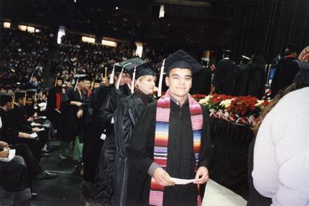 Graduate at commencement