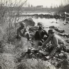 Men at campfire