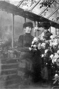 Clara and Edith Leopold in greenhouse