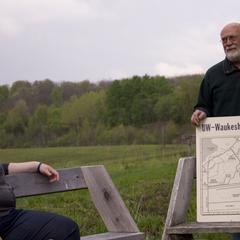 Marlin Johnson with map of Field Station