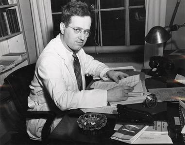 Dr. Harry Bouman at his desk