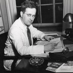 Dr. Harry Bouman at his desk