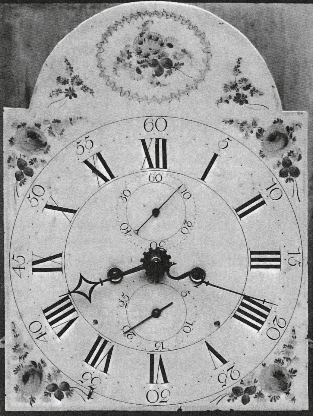 Black and white photograph of an eight-day, strike, repeater, alarm clock.