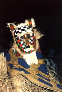 Dancer with Checkered Mask
