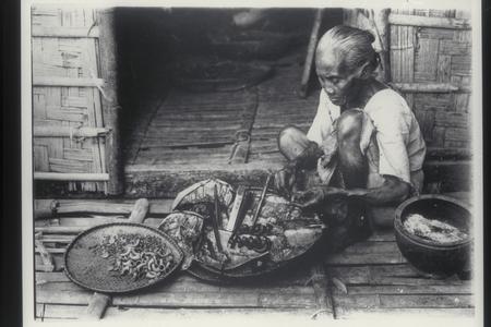 Woman pipe maker, Ilocos Norte, 1926
