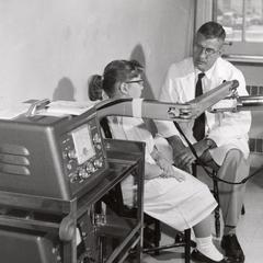 Dr. Edwin C. Albright using a scintillometer test
