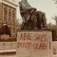 Graffiti on Bascom Hill statue of Abraham Lincoln states "Abe says don't scab".