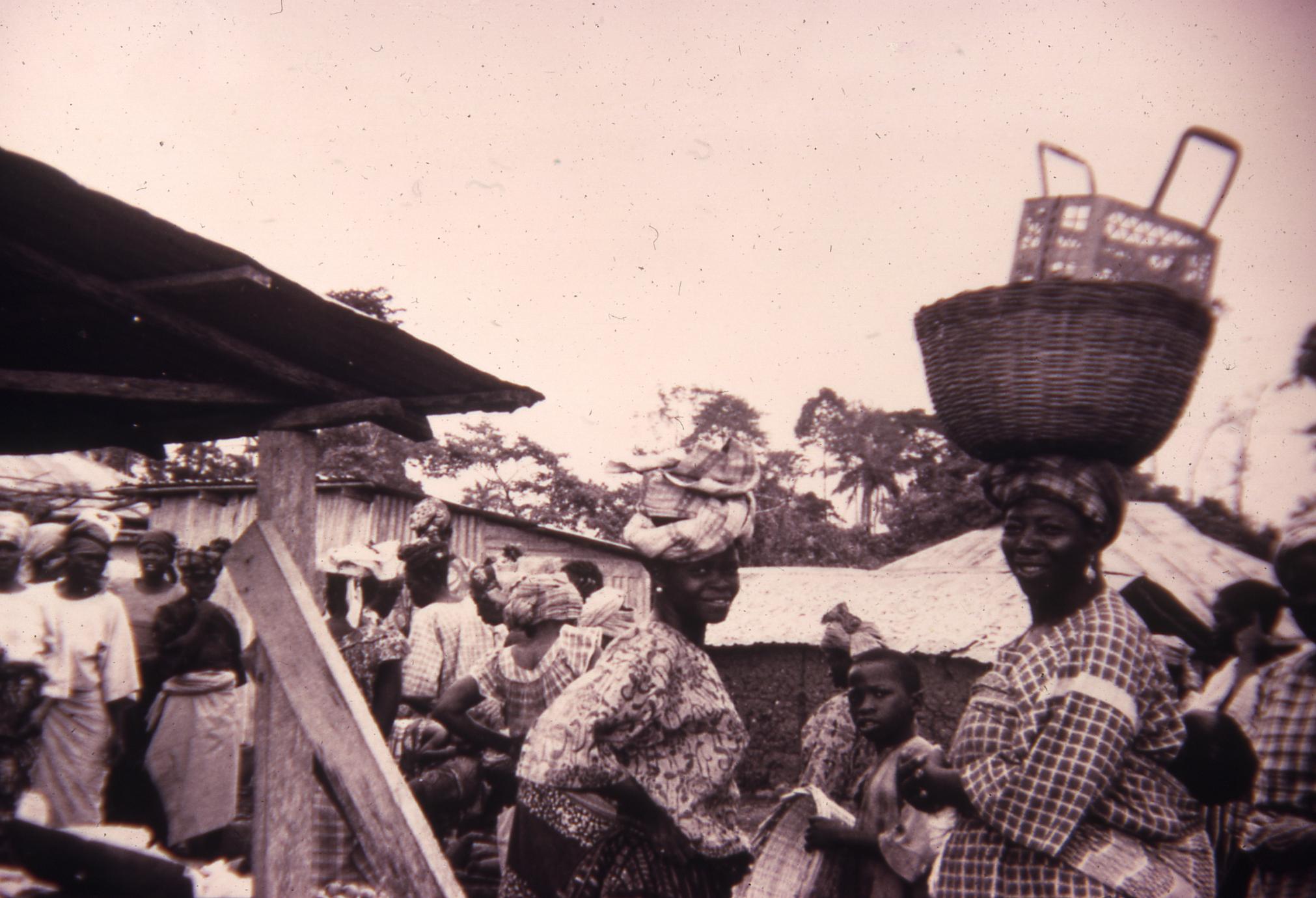 Crowd and woman with basket