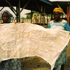 Women holding fabric