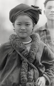 A Yao (Iu Mien) girl in traditional clothing and silver adornments in Houa Khong Province