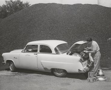 Walter Meives loading car