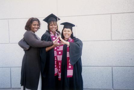 Three women at 2002 graduation