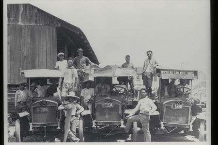 Lumber trucks, Manila, 1928