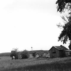 Aldo Leopold in shack prairie