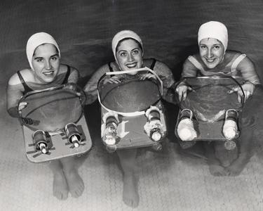 Three female swimmers