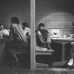 Students relaxing and talking in Rathskeller in rear of student union