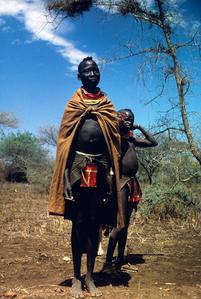 Karamojang Teenage Herder and Child