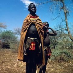 Karamojang Teenage Herder and Child