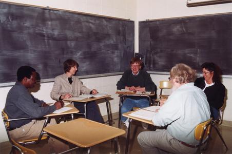 Professors sitting in a classroom