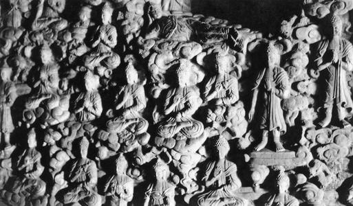 A section of terracotta relief depicting the story of the Buddha's life.
