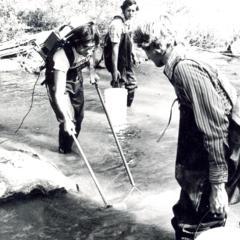 Environmental studies students in river