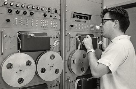 Man monitoring machine at Biotron