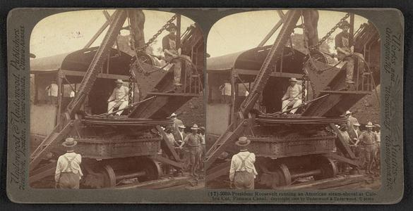Theodore Roosevelt atop a steam shovel in Panama