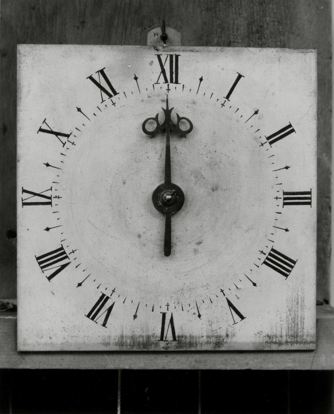 Black and white photograph of a timepiece.