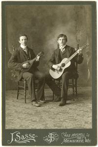 Two men with string instruments