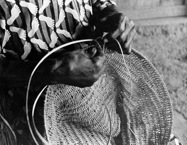 Woman Making Fish Net