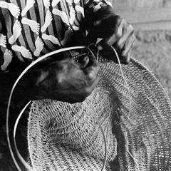 Woman Making Fish Net