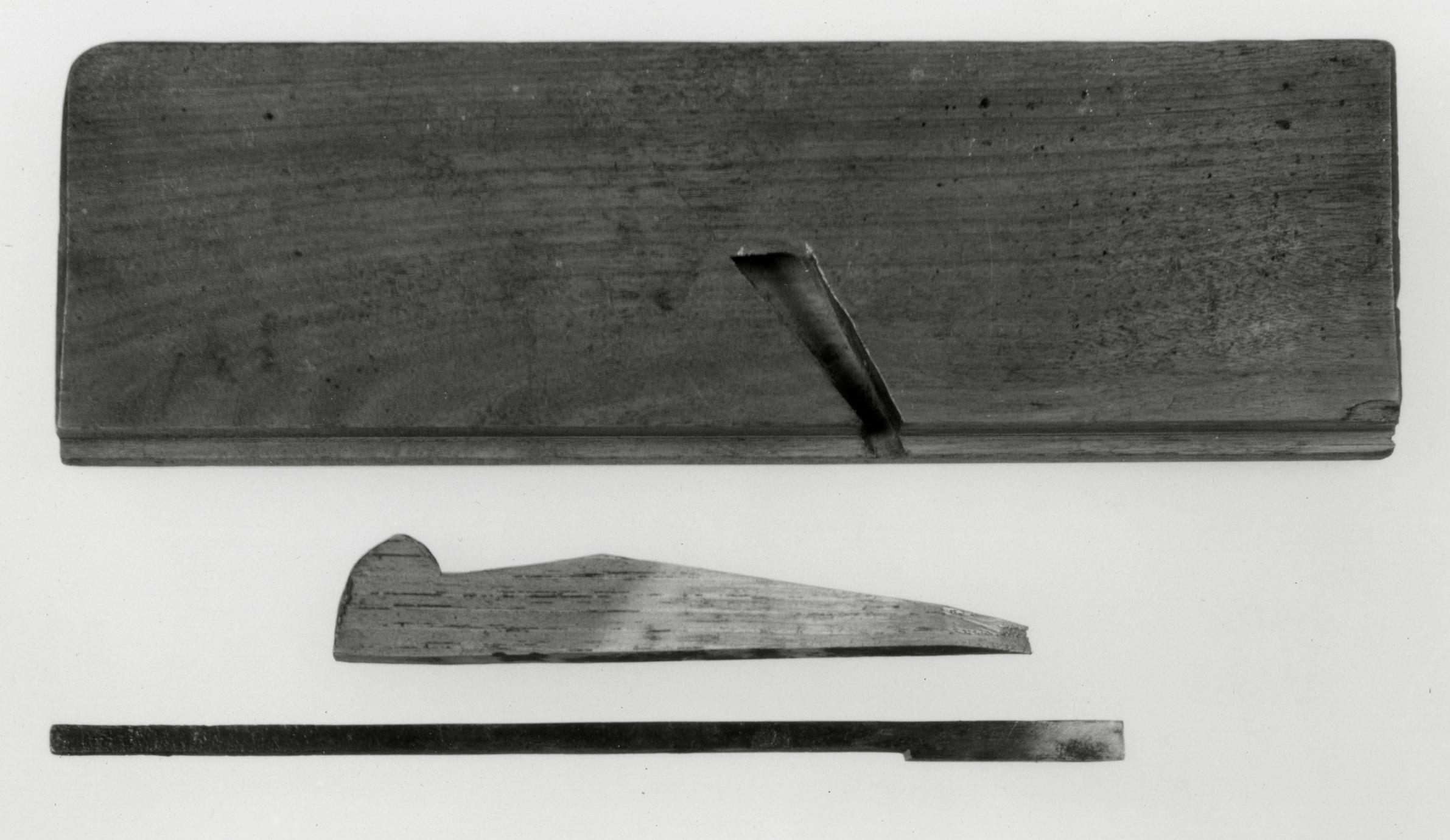 Black and white photograph of a rabbet plane.