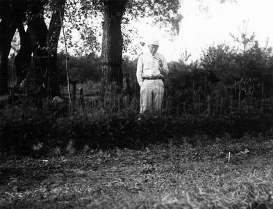 Aldo tending tamarack seedlings, near the Shack, ca. 1946