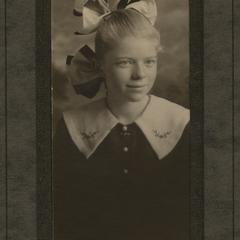 Young Lorine with black and white bow