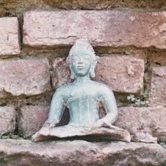 Ancient Buddhist bronze figurine near the village of Chommok in Houa Khong Province