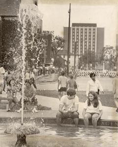 Students enjoying the fountain