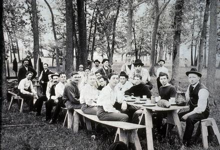 Men picnic with beer