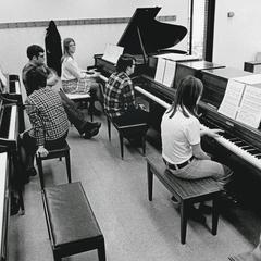 Students practicing piano