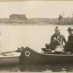 Canoeing in Quetico, cabin in background, June 1924